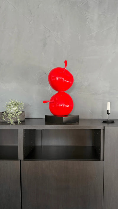 Estatua de manzanas apiladas