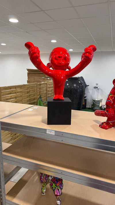 Statua Personaggio Rosso – Due Pollici in Su